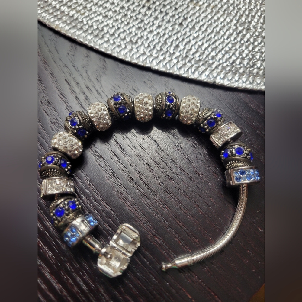 Bracelet With Blue Rhinestone Charms And Barrel Like Clasp
